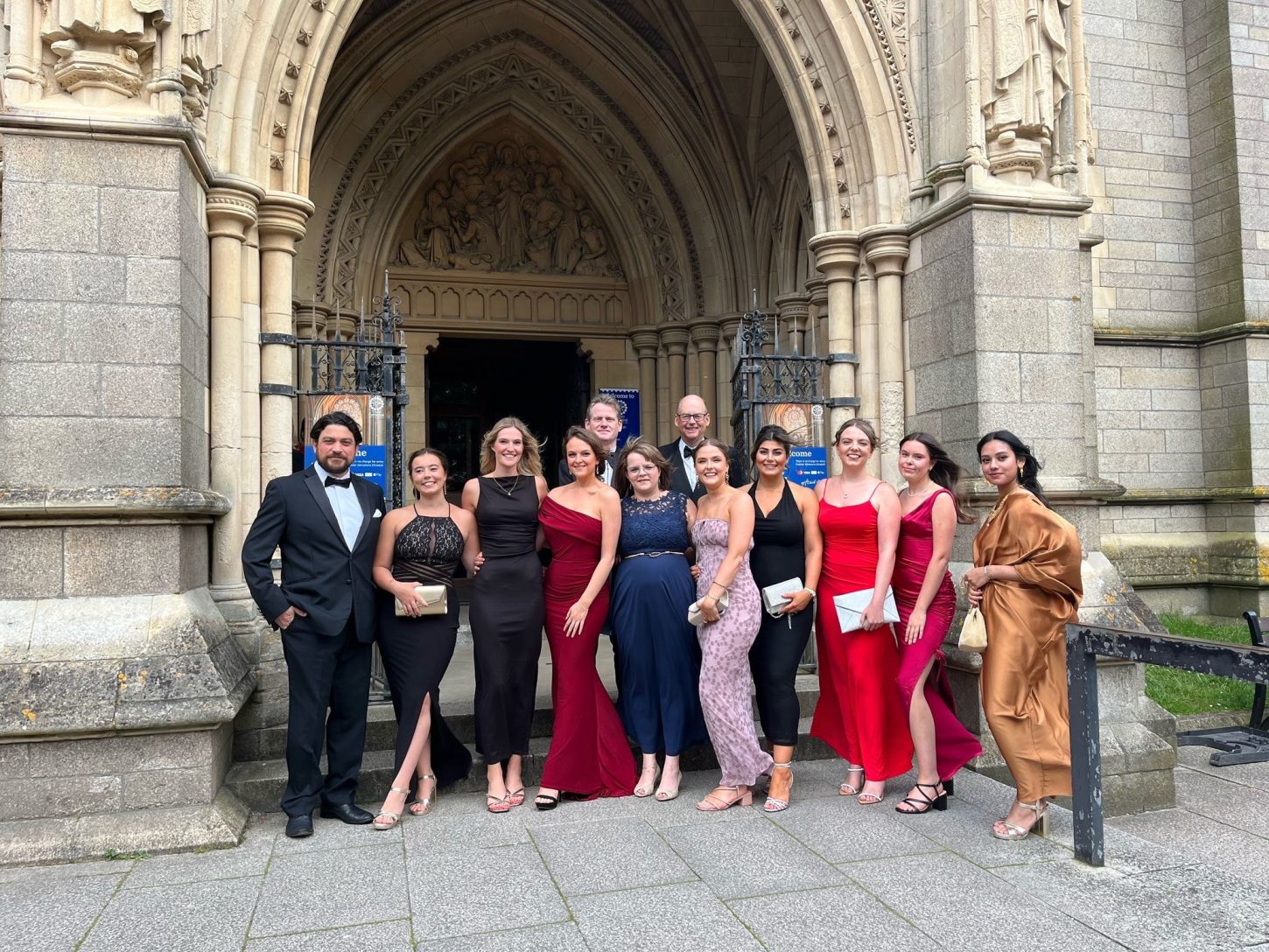 The team attending the Cornwall Law Society Awards from Penderlaw Solicitors standing outside Truro Cathedral where they won Small Firm of the Year